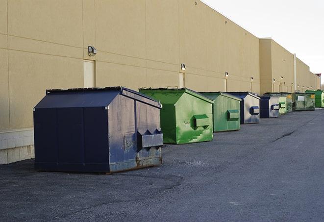 a row of construction dumpsters parked on a jobsite in Chatsworth